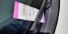 A courtesy parking ticket left on a car window on Smithfield Street in Downtown 